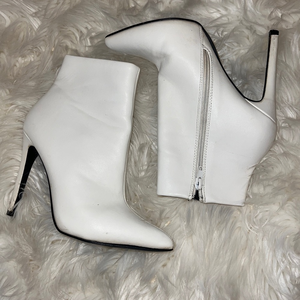 Two pairs of black & white booties